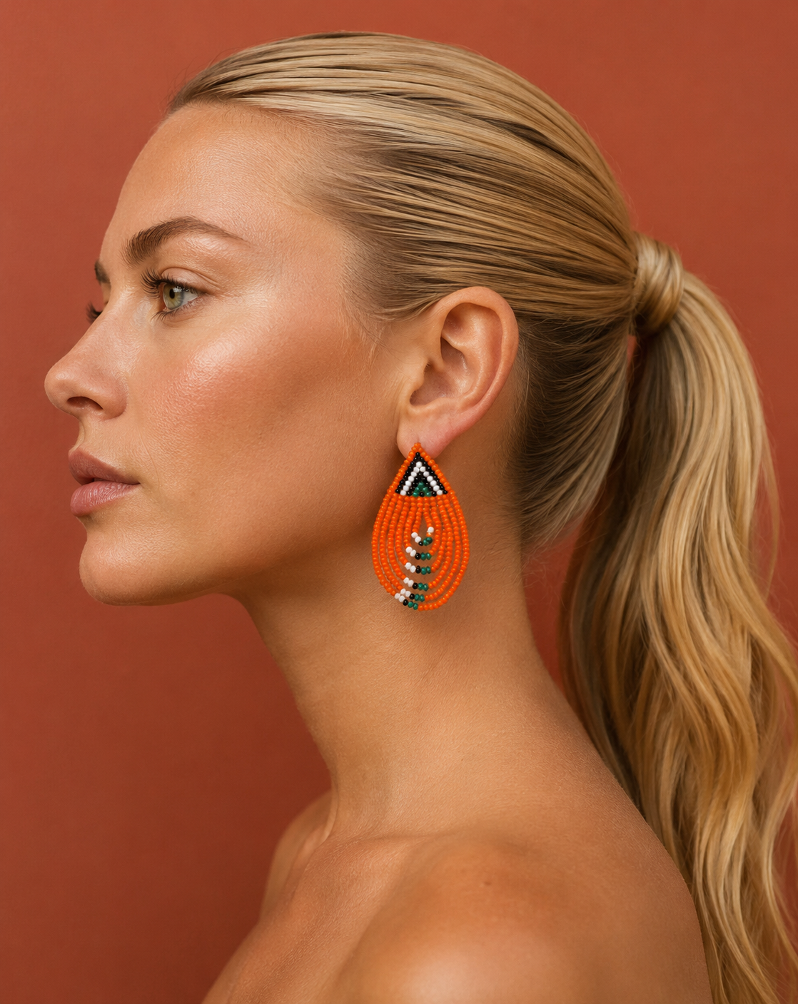 Pendientes masái cascada naranja