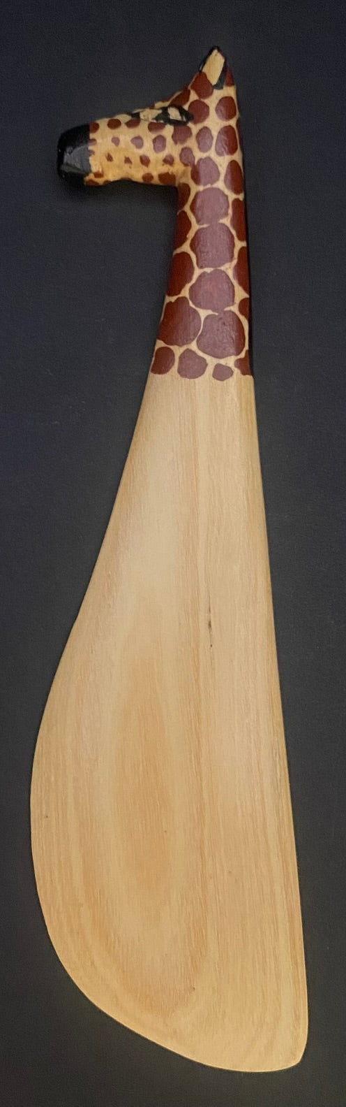 Maasai spreading cutlery giraffe