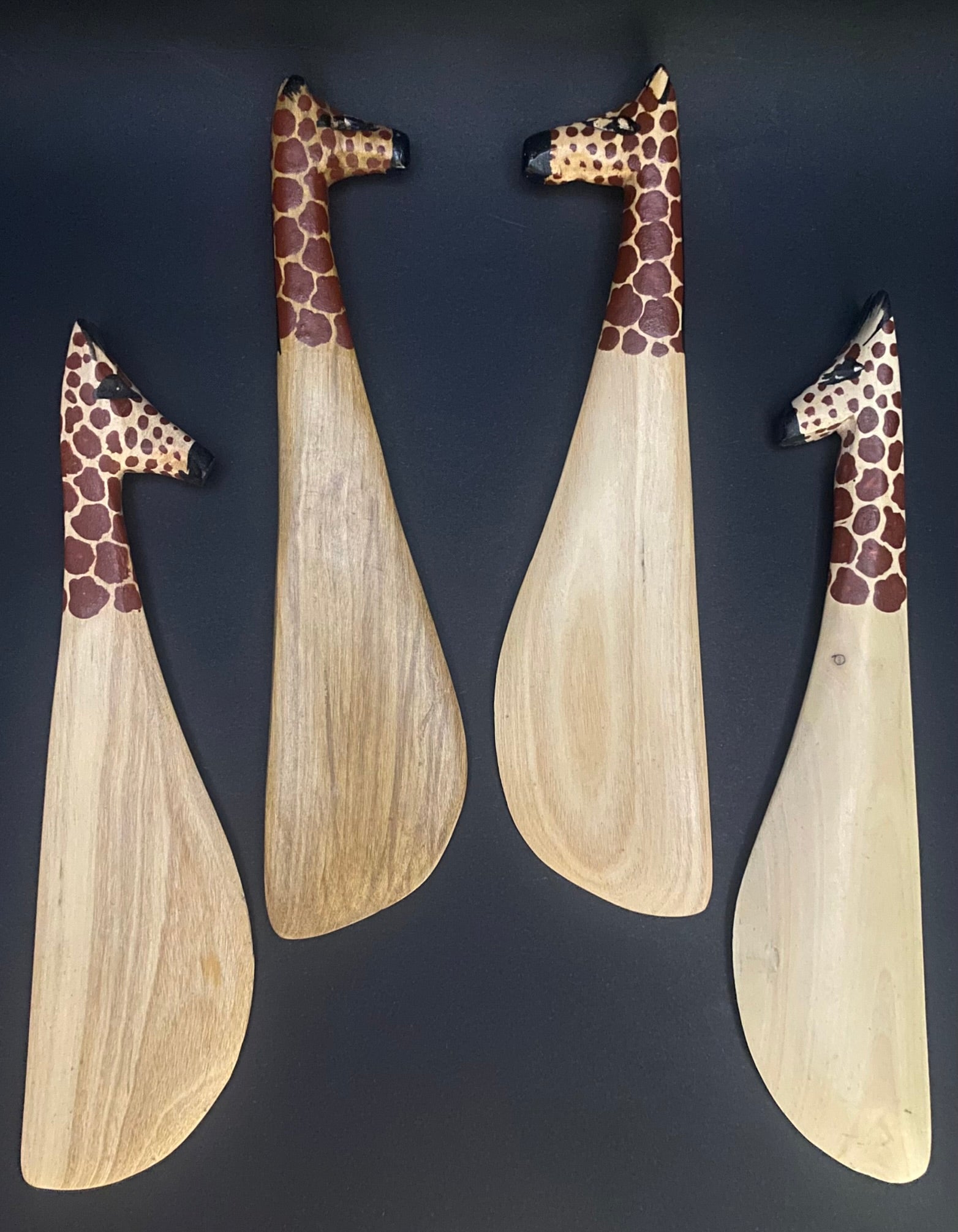 Maasai spreading cutlery giraffe